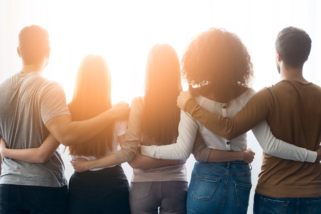 back-view-community-of-young-people-united