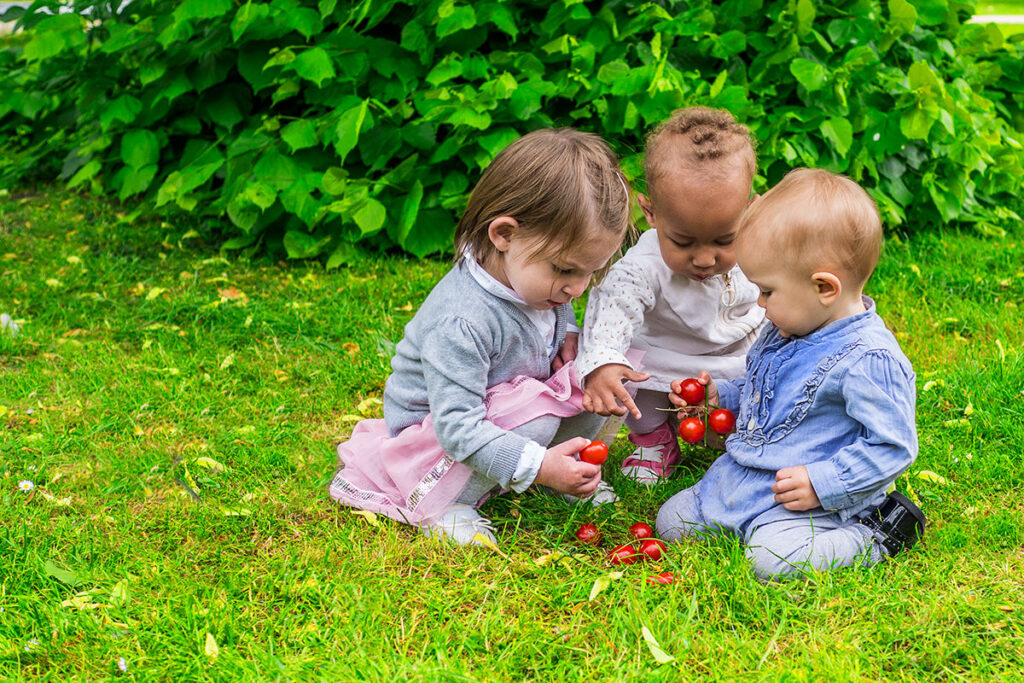 Young children playing outside