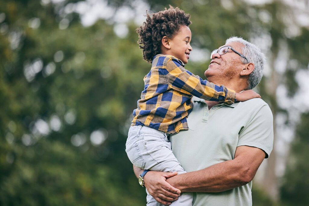 Man holding his grandson