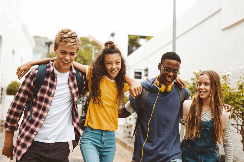 Group of young people walking together